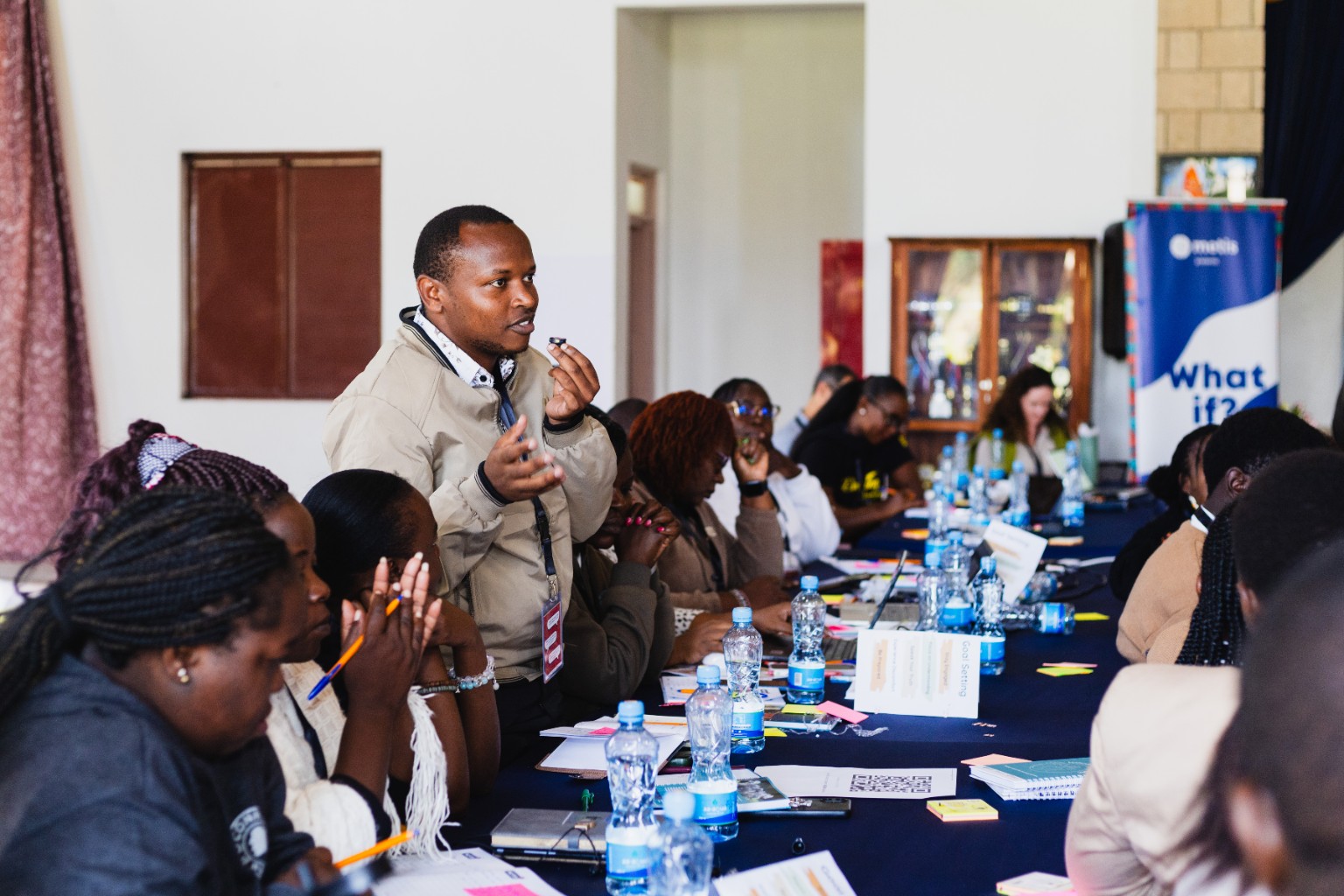 Daniel Kamau facilitating an education session with educators