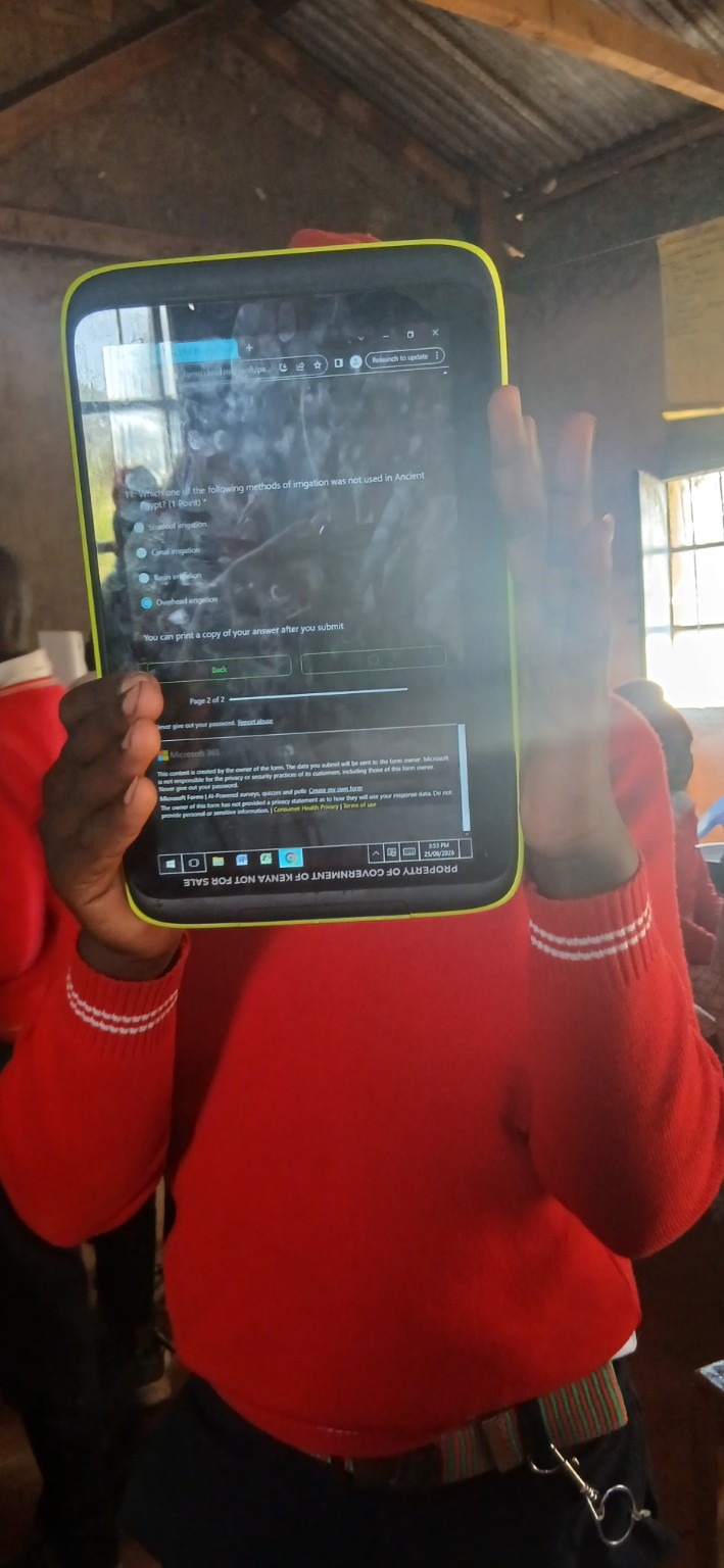 Learner using a digital tablet for an assessment activity