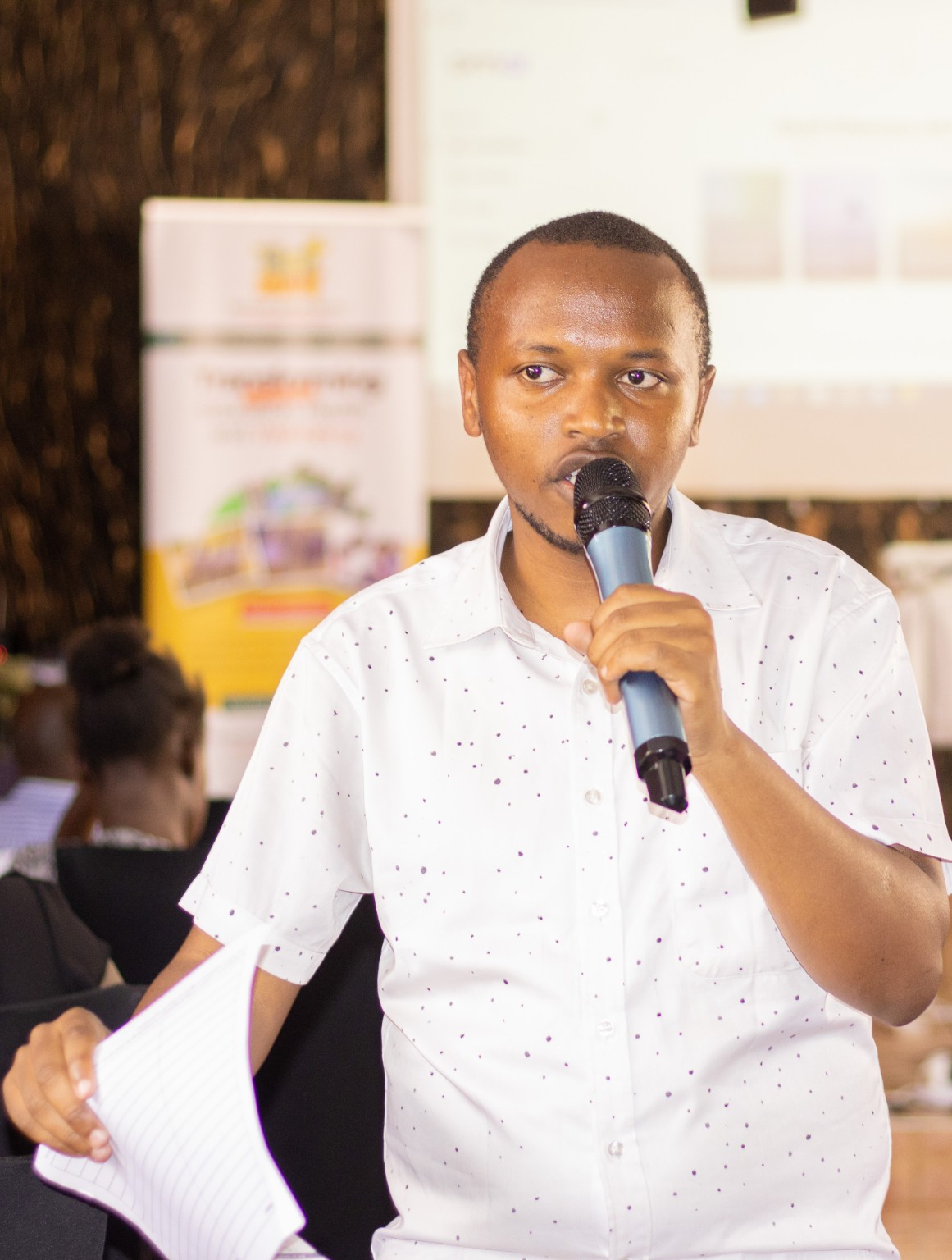 Daniel Kamau facilitating an education session in a rural school
